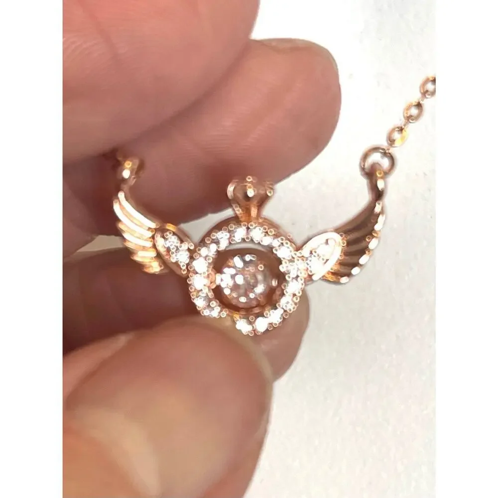 Rose Gold Over Stainless Angel Wing Trimbler Necklace, CZ’s Lobster Claw Clasp